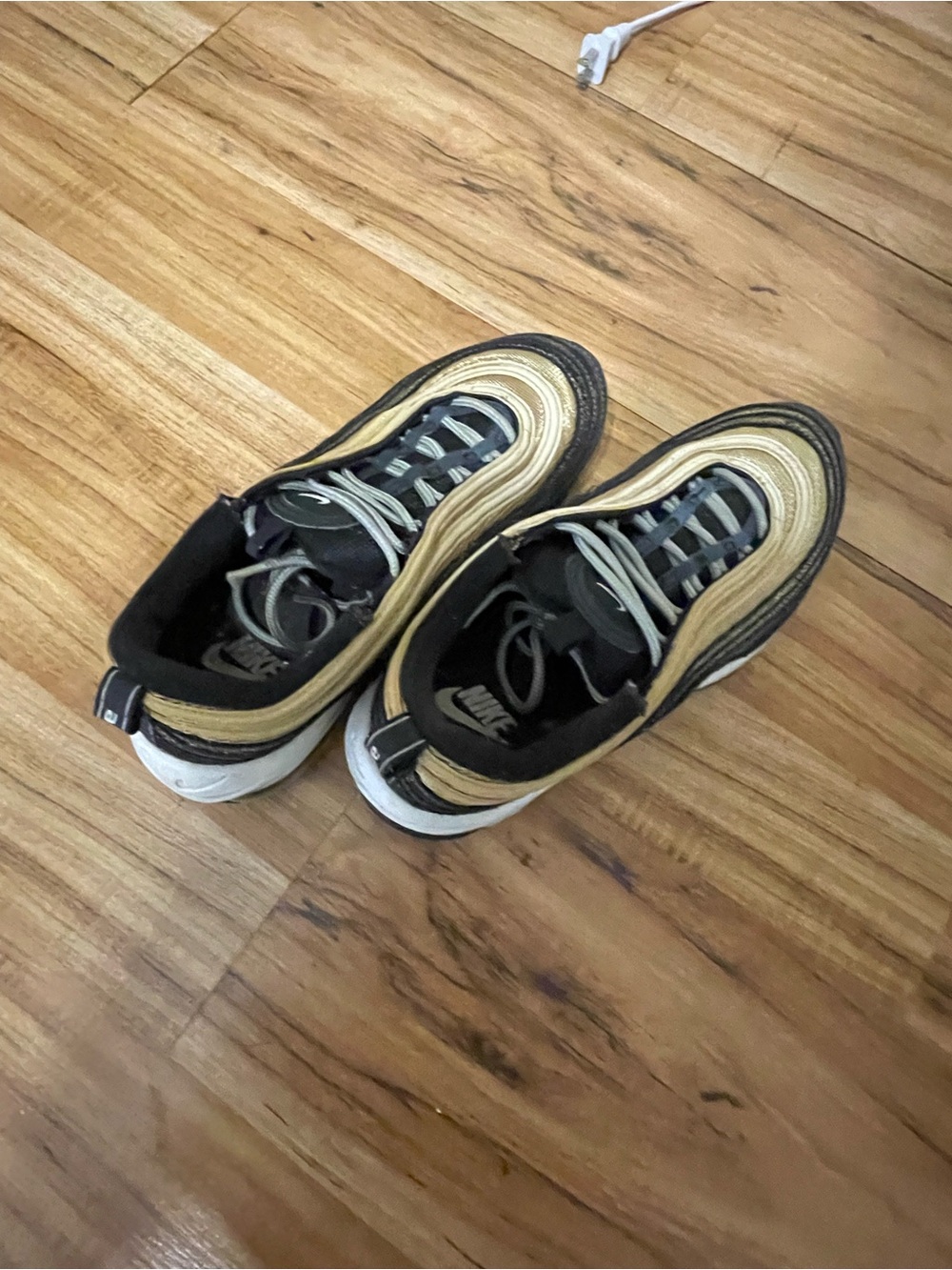 Nike Men’s Air Max 97 in Black and Gold